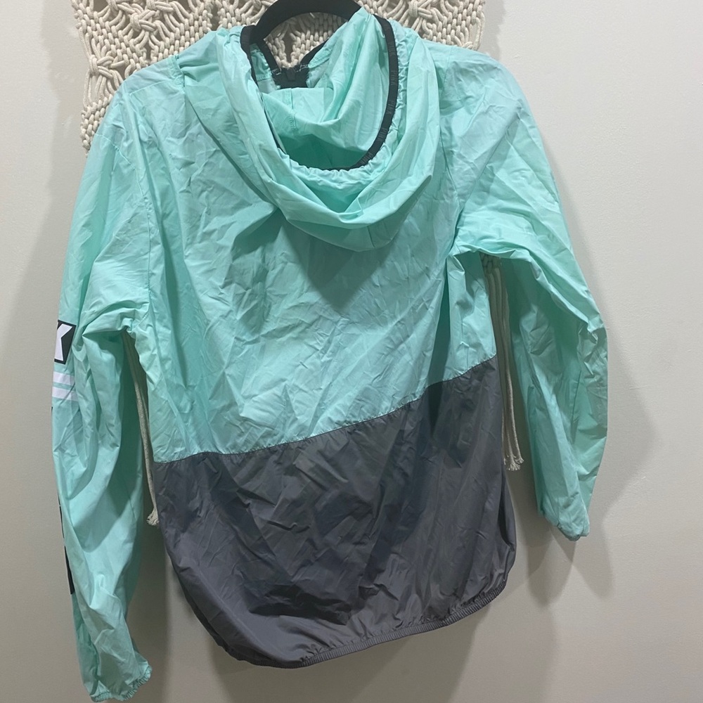 PINK raincoat, never worn/zip-up